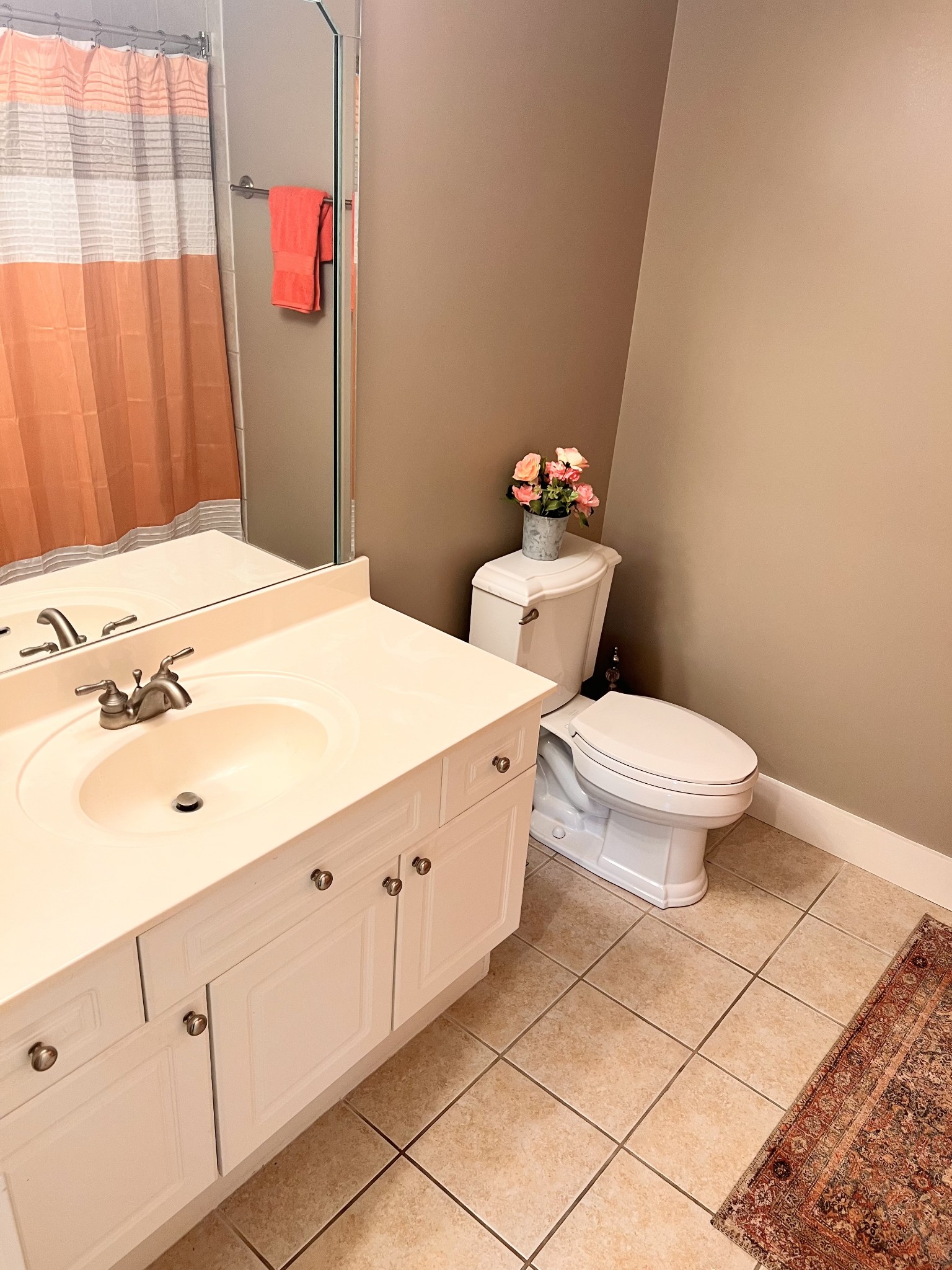 657 Nickolas Drive, Unit 657 Lebanon, TN 37087 - Photo 20 of 27 a bathroom with a sink a toilet and shower