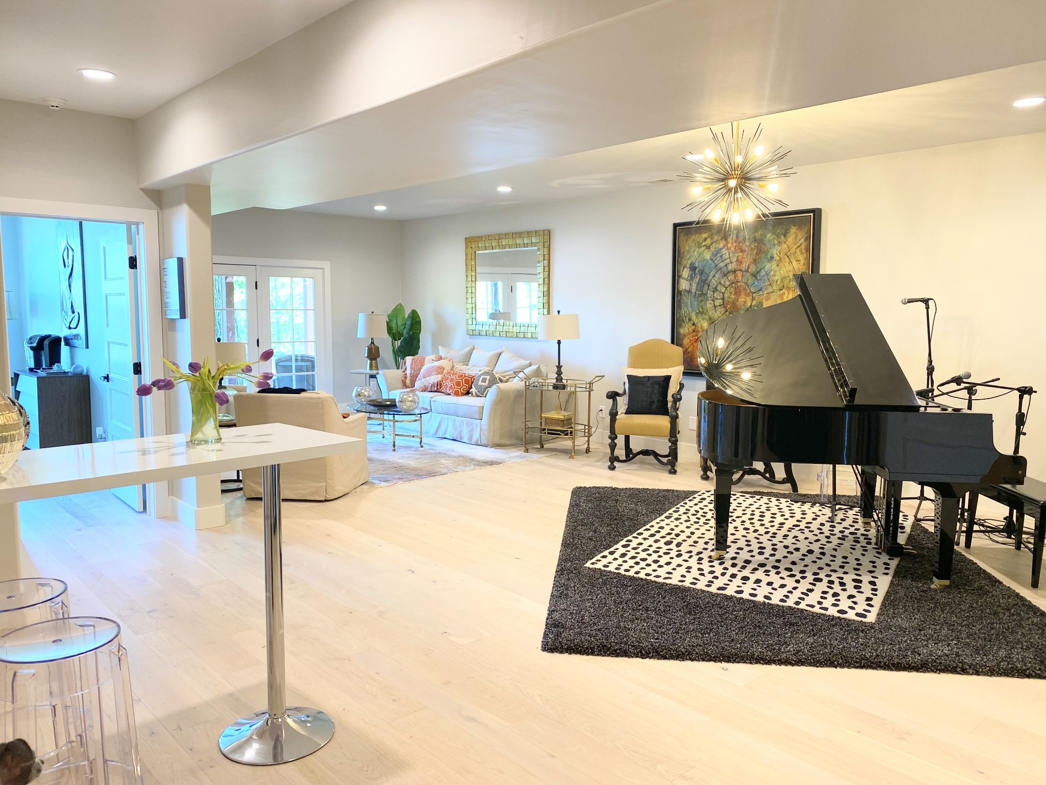 657 Nickolas Drive, Unit 657 Lebanon, TN 37087 - Photo 23 of 27 a living room with furniture and a chandelier