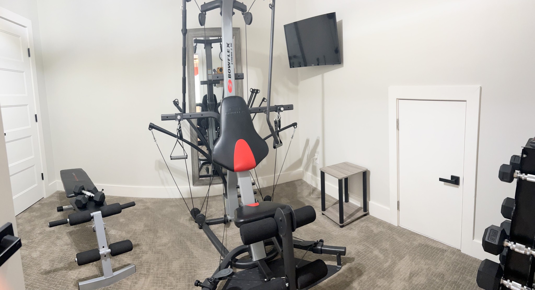 657 Nickolas Drive, Unit 657 Lebanon, TN 37087 - Photo 27 of 27 a room with gym equipment and mirror