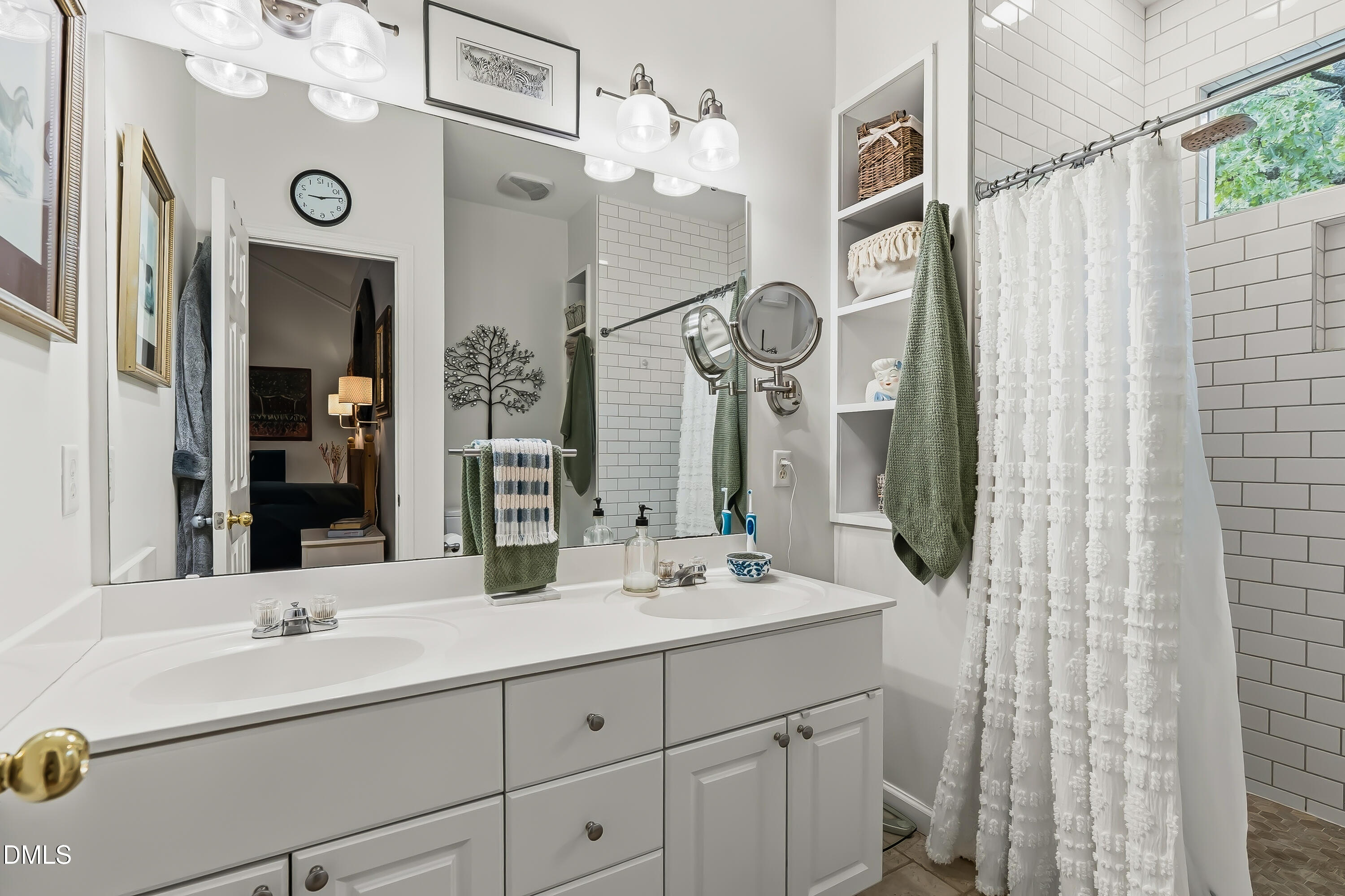 1214 Halcyon Place Rougemont, NC 27572 - Photo 13 of 69 a bathroom with a double vanity sink mirror and vanity