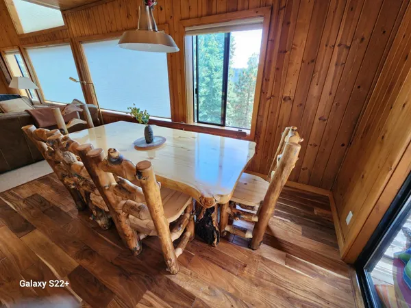 a view of a balcony with chairs