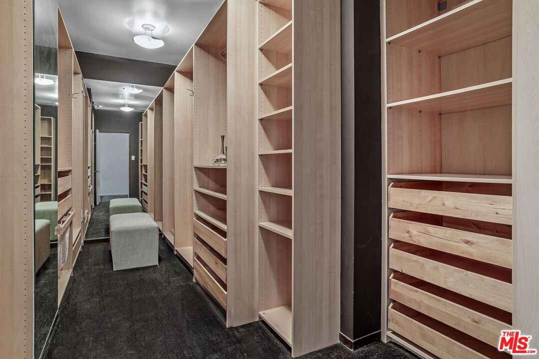 4216 Woodcliff Road Sherman Oaks, CA 91403 - Photo 21 of 56 a view of walk in closet