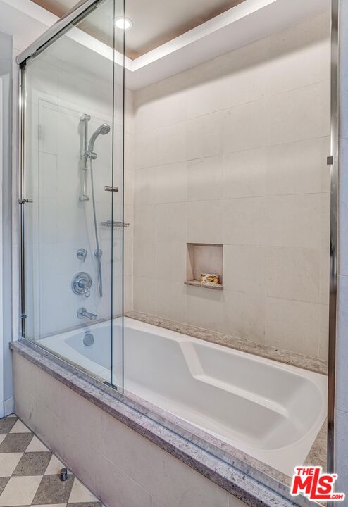 4216 Woodcliff Road Sherman Oaks, CA 91403 - Photo 25 of 56 a bathroom with a bathtub and a shower