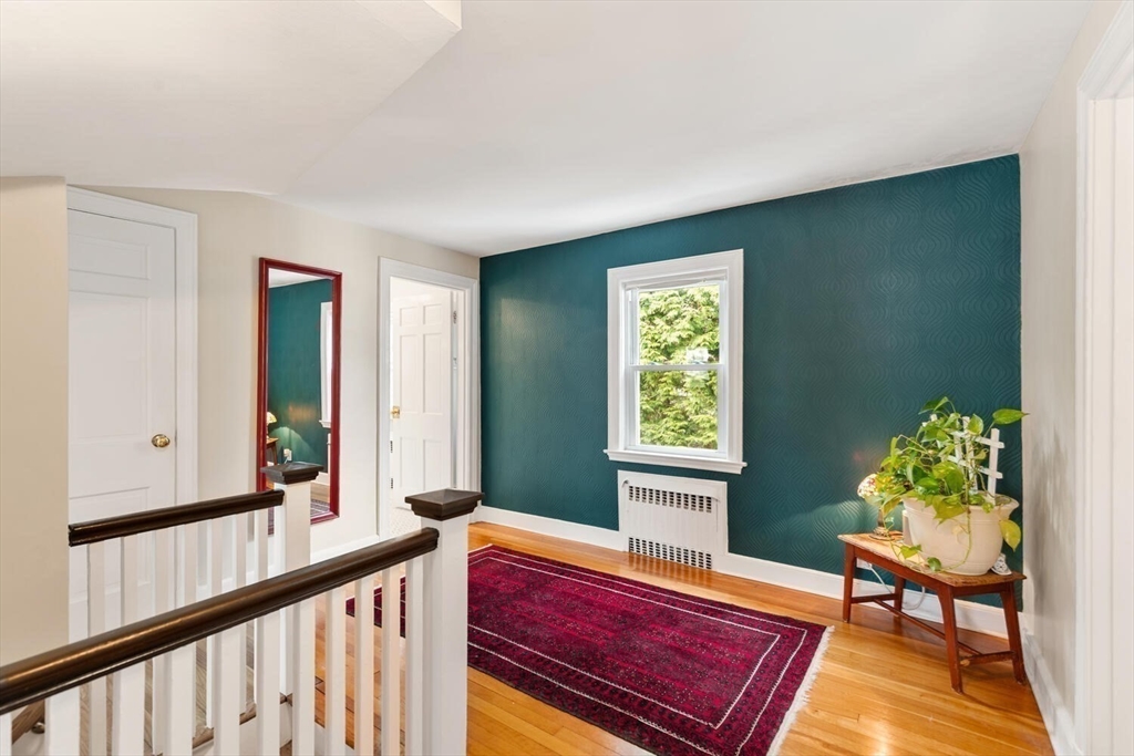 32 Kings Beach Terrace Swampscott, MA 01907 - Photo 29 of 40 a living room with furniture and a potted plant