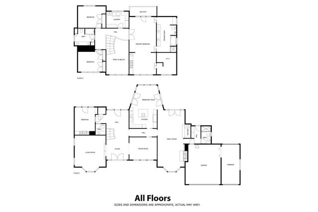 a spacious bathroom with a bathtub a sink and a window