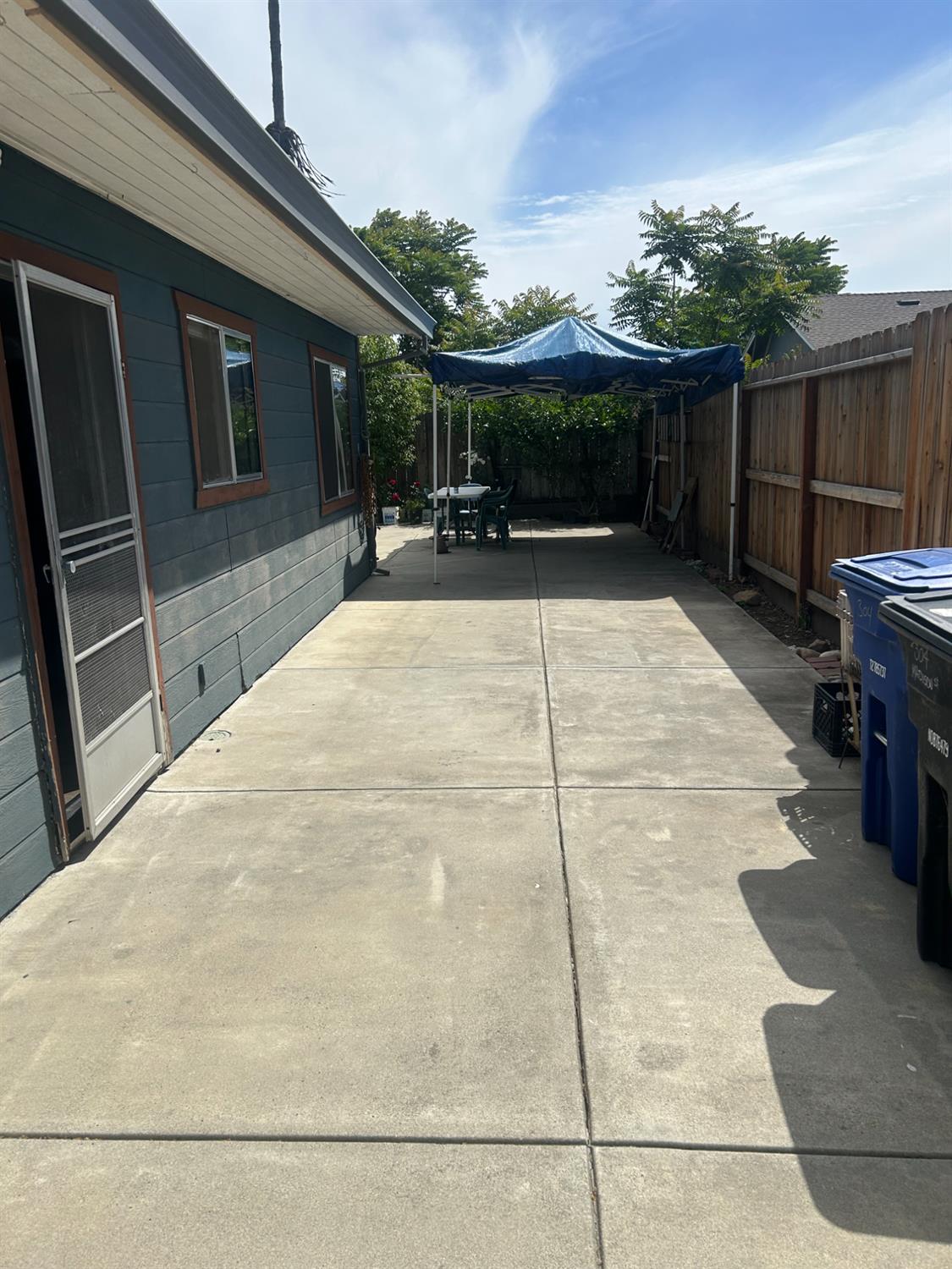 304 North Madison Street Modesto, CA 95351 - Photo 3 of 12 a view of backyard with seating space