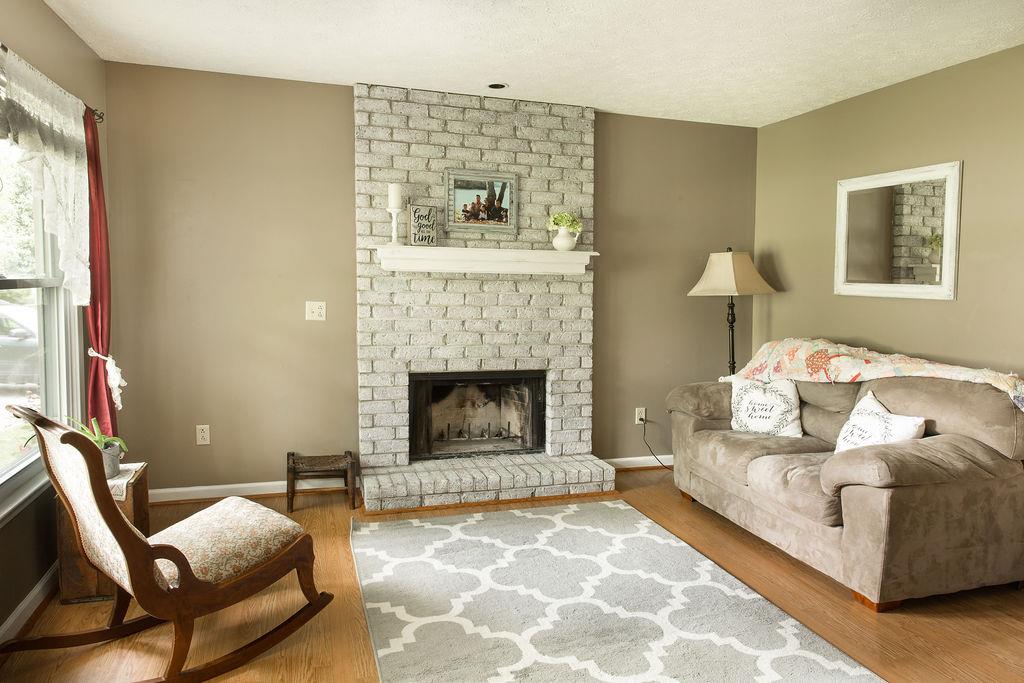 1085 Kathryn Road Mount Juliet, TN 37122 - Photo 3 of 25 Living room with wood burning fireplace.