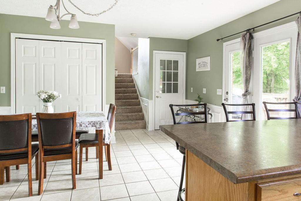 1085 Kathryn Road Mount Juliet, TN 37122 - Photo 7 of 25 Eating area, door to side entry garage, door to back deck and staircase to bonus room.