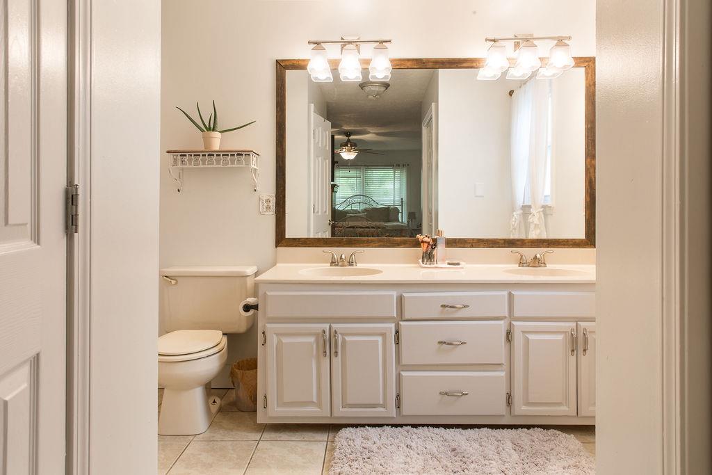 1085 Kathryn Road Mount Juliet, TN 37122 - Photo 10 of 25 Large master bath with double sink vanity and his & hers walk-in closet.