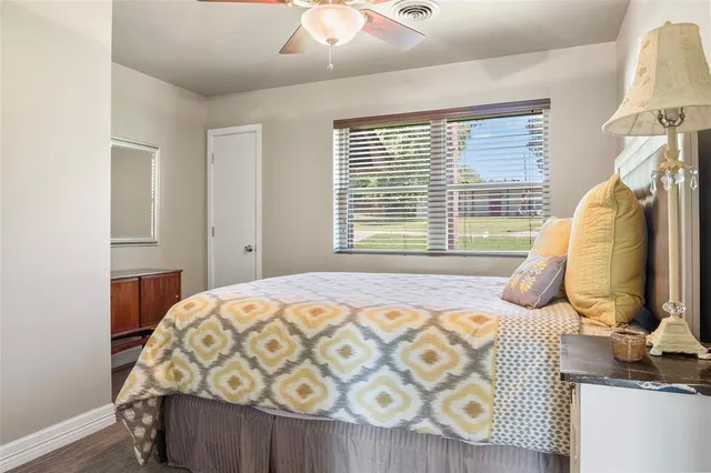 an aerial view of a houses with outdoor space and ocean view