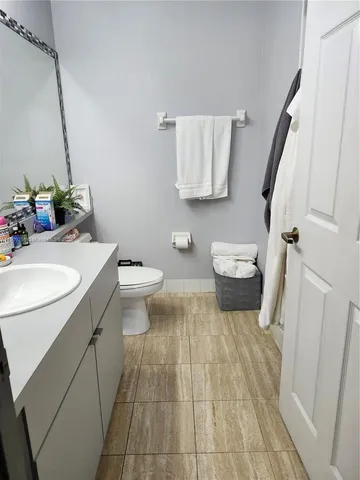 a view of balcony with wooden floor