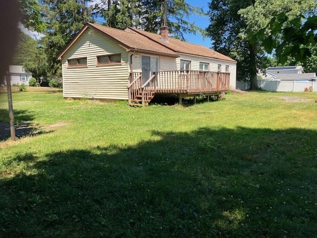 14 Birchwood Road Southwick, MA 01077 - Photo 2 of 25 a front view of a house with a yard and trees