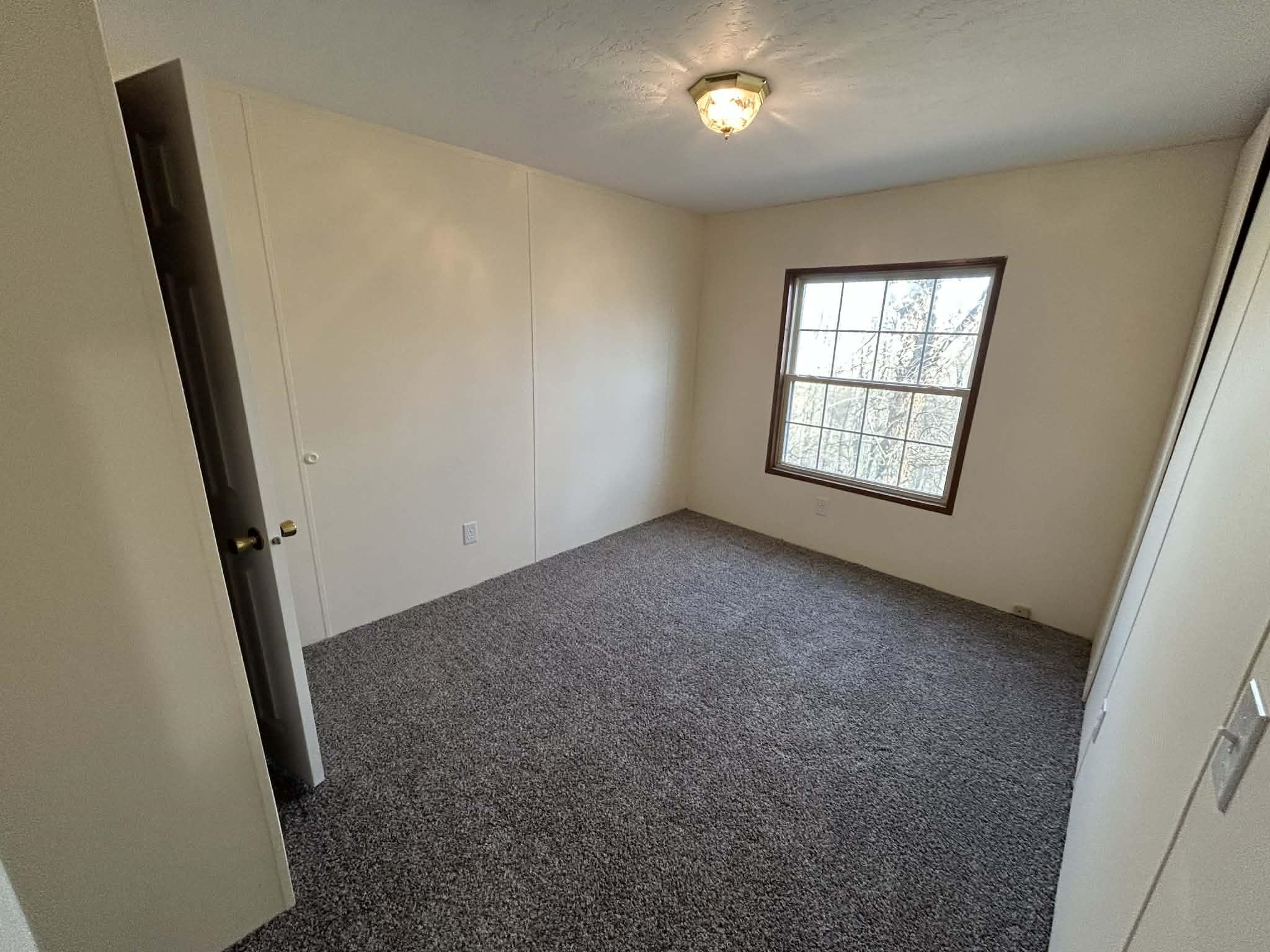 104 Bentwood Drive Blue Ridge, VA 24064 - Photo 11 of 19 a view of an empty room with a window