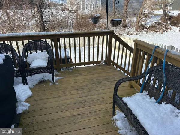 a view of a balcony with chairs