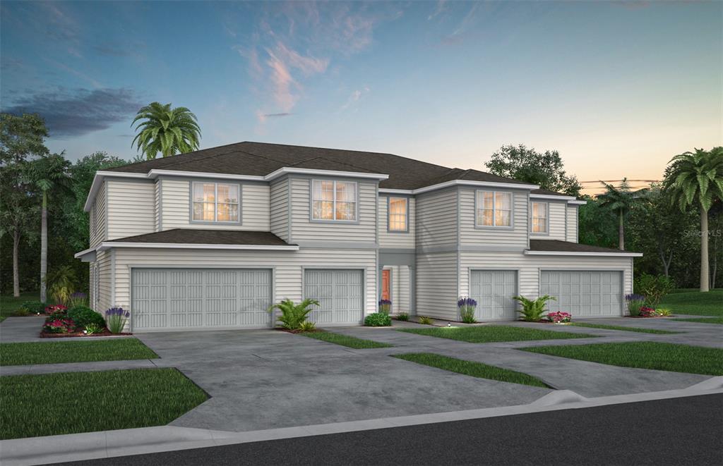 4641 Sparkling Shell Avenue Kissimmee, FL 34746 - Photo 1 of 1 a front view of a house with a yard and a garage