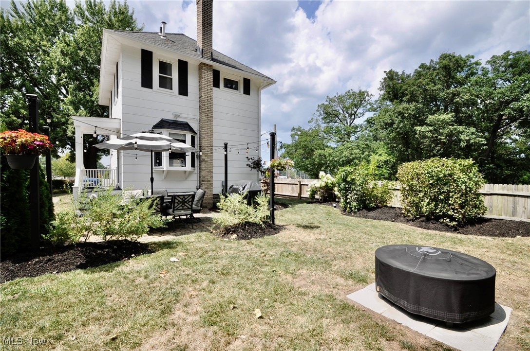 467 Cahoon Road Bay Village, OH 44140 - Photo 32 of 41 Rear view of house with a chimney