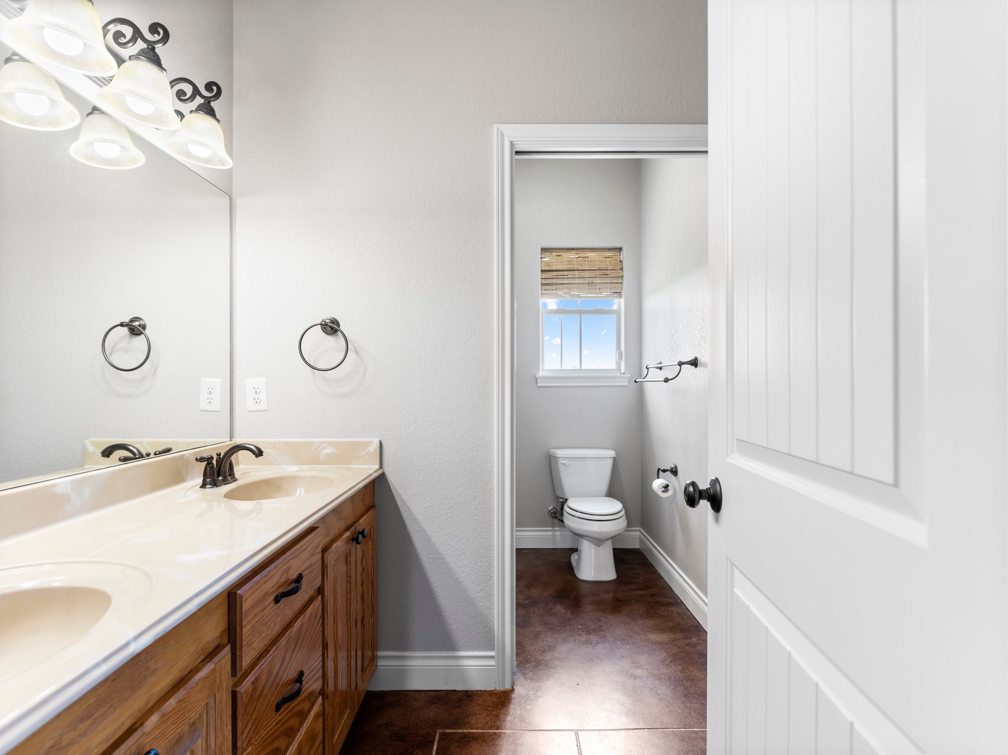 10630 Brinkmeyer Road Needville, TX 77461 - Photo 23 of 50 a bathroom with a sink a toilet and shower