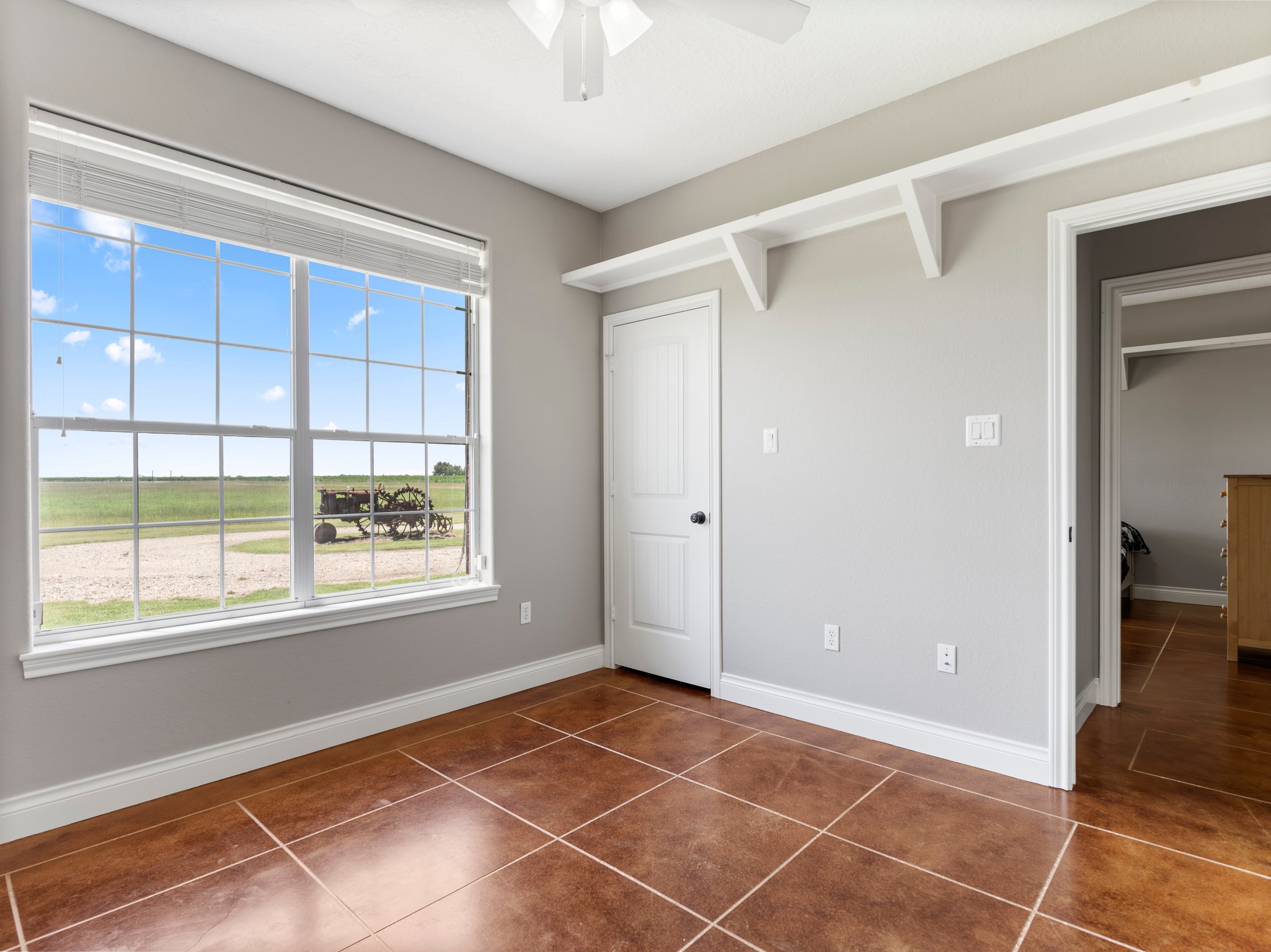 10630 Brinkmeyer Road Needville, TX 77461 - Photo 26 of 50 a view of an empty room with a window