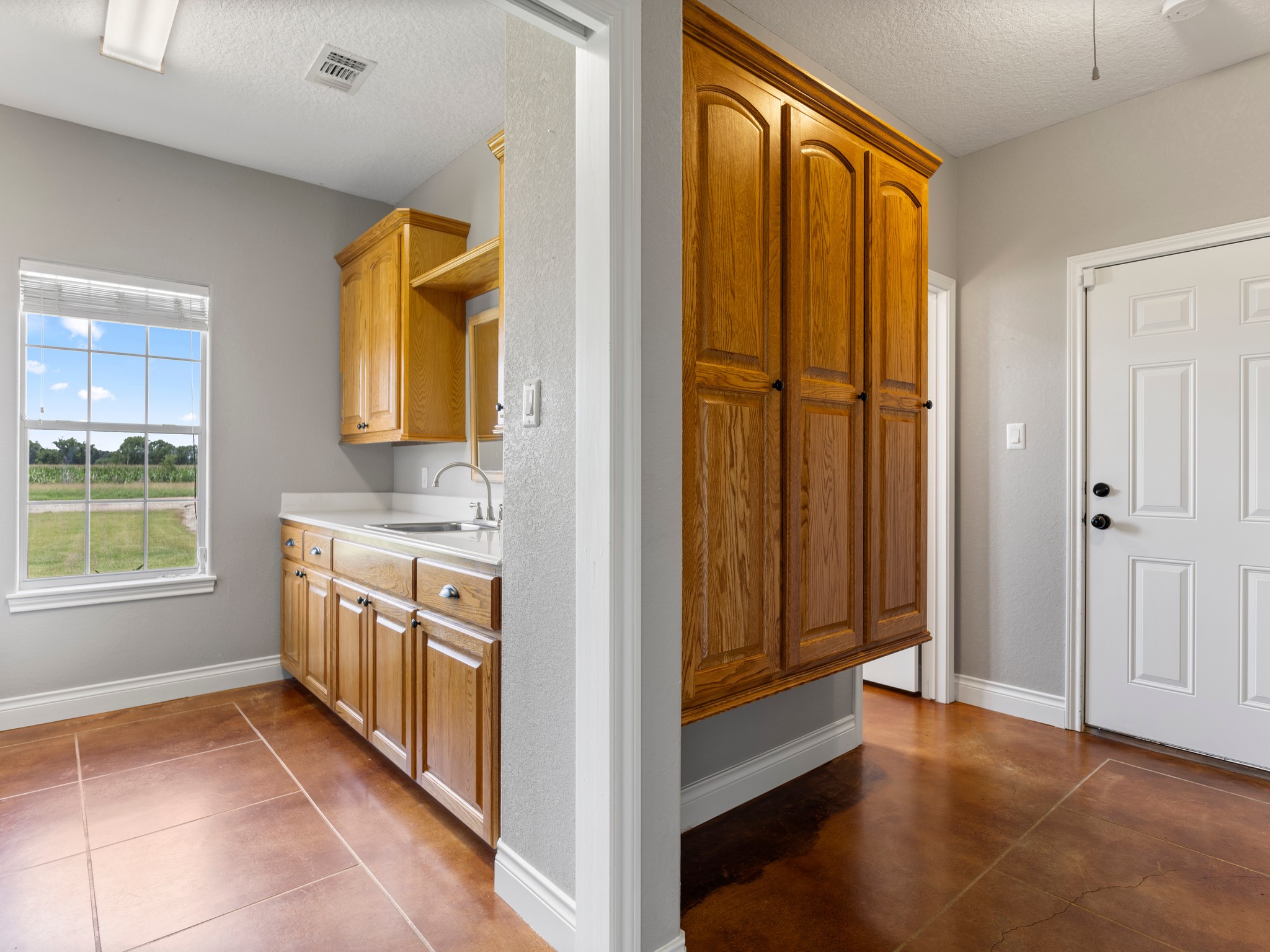 10630 Brinkmeyer Road Needville, TX 77461 - Photo 37 of 50 a view of a kitchen with electric appliances