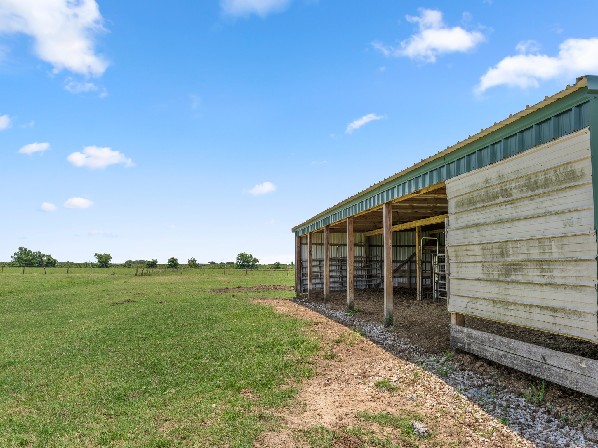 10630 Brinkmeyer Road Needville, TX 77461 - Photo 46 of 50 a front view of a house with a yard