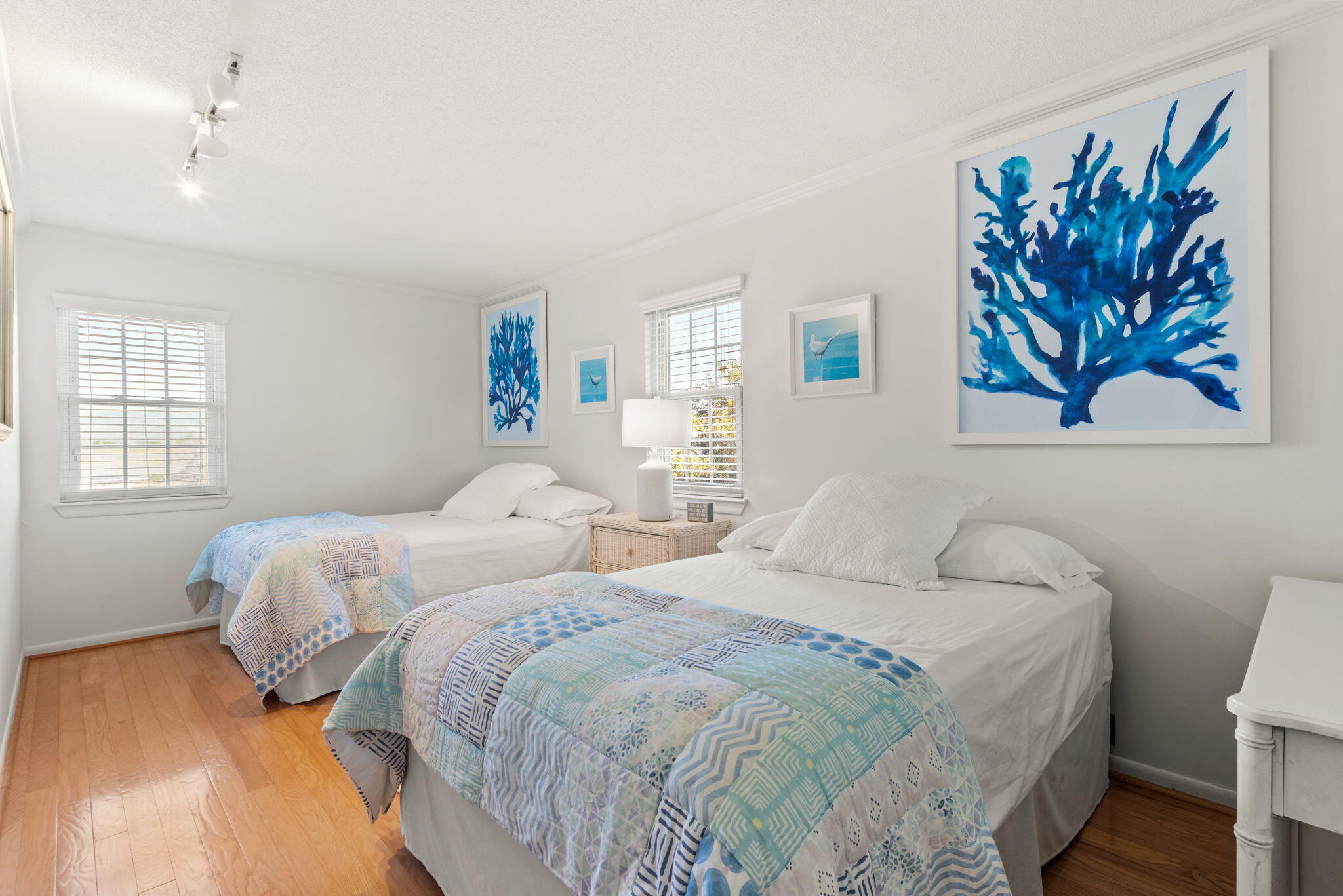 71 Baird Road Santa Rosa Beach, FL 32459 - Photo 21 of 29 a bedroom with two beds and a painting on the wall