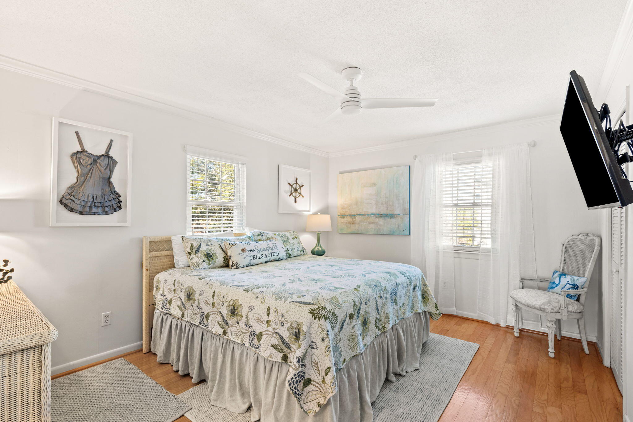 71 Baird Road Santa Rosa Beach, FL 32459 - Photo 53 of 63 a bedroom with a bed and a flat screen tv