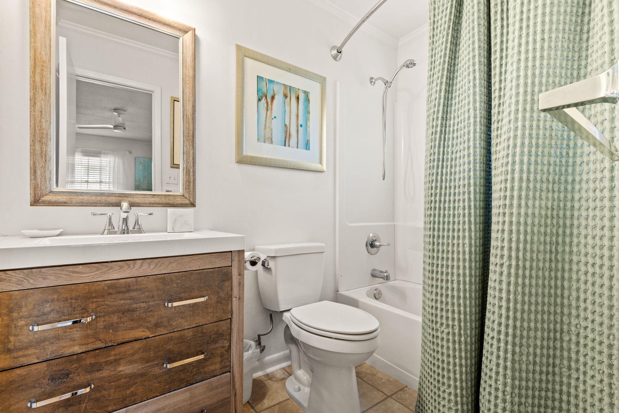 71 Baird Road Santa Rosa Beach, FL 32459 - Photo 56 of 63 a bathroom with a toilet a sink and mirror