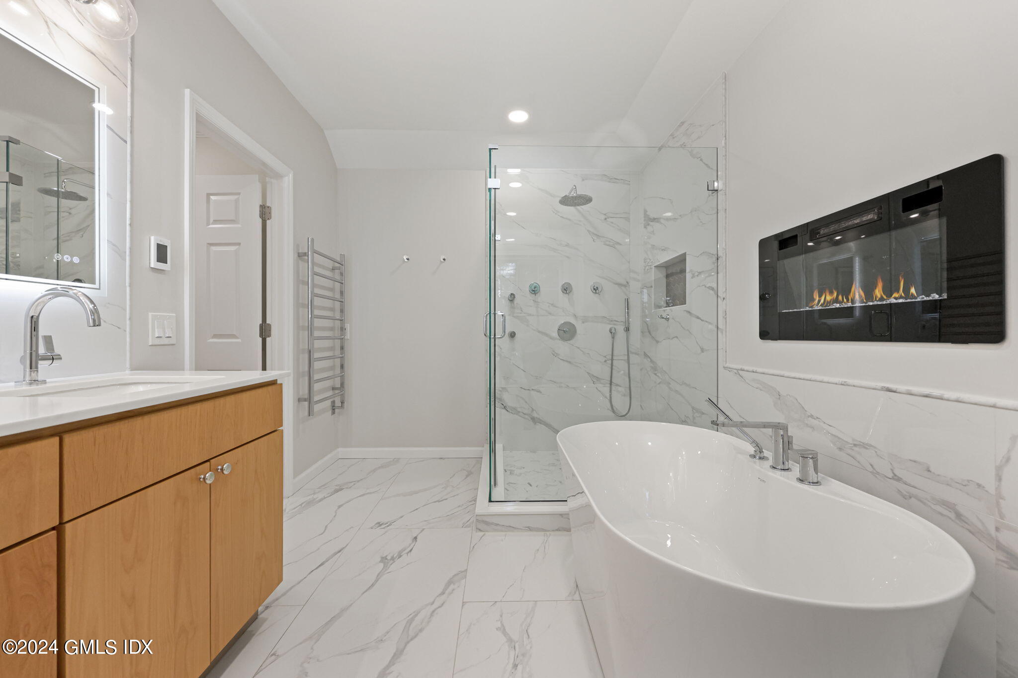 48 Spring Street, Unit 8 Greenwich, CT 06830 - Photo 20 of 24 a bathroom with a sink a toilet and shower