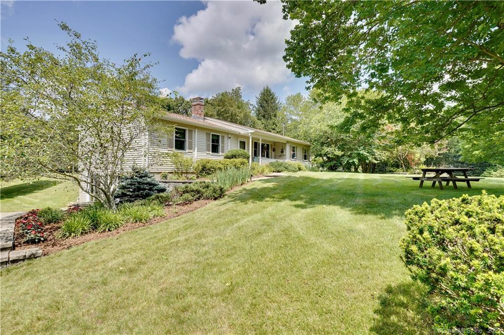 180 Buckley Road Colchester, CT 06415 - Photo 1 of 1 a view of a house with a yard