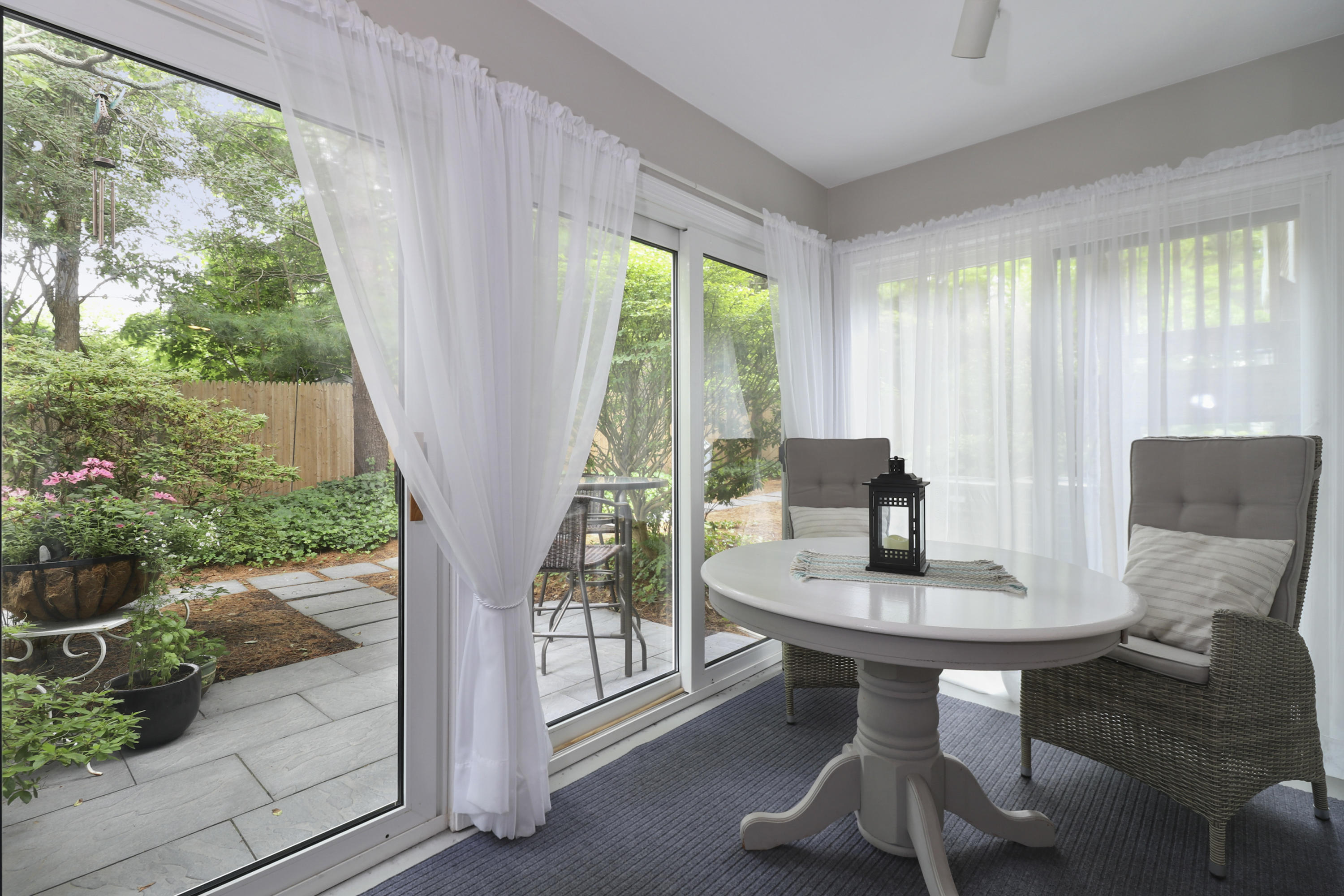727 Main Street, Unit E1 Osterville, MA 02655 - Photo 11 of 20 a view of a dining room with furniture window and outside view