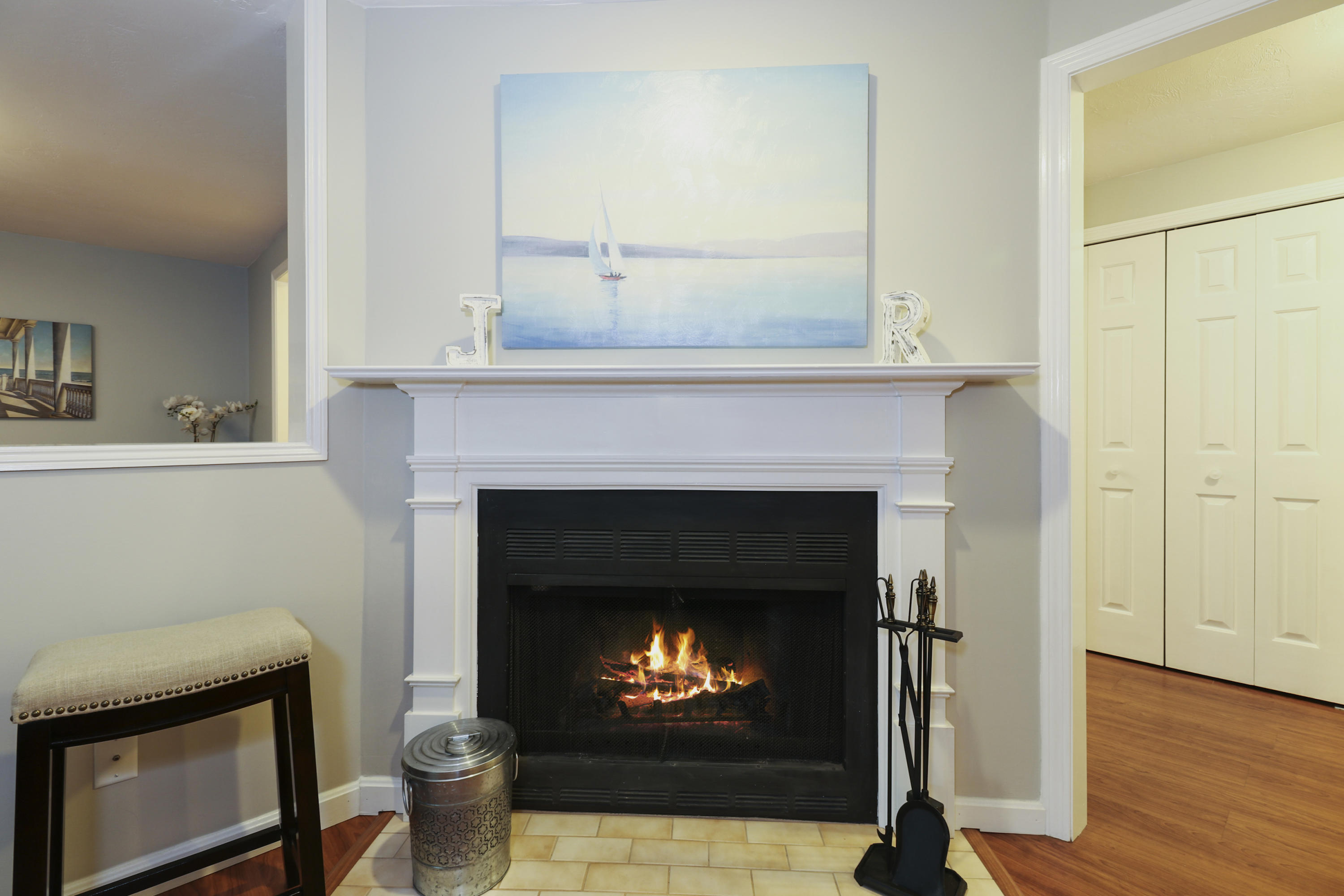 727 Main Street, Unit E1 Osterville, MA 02655 - Photo 5 of 20 a living room with a fireplace