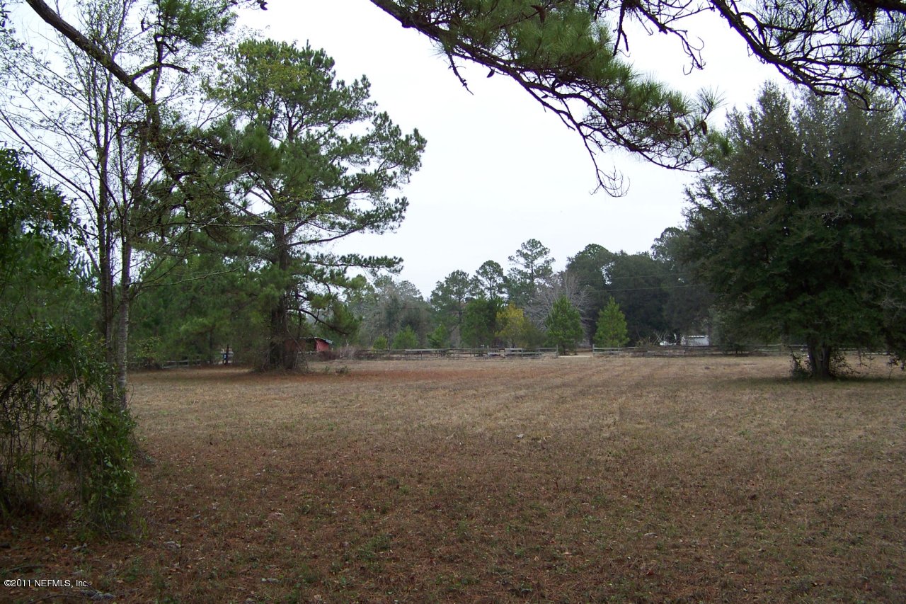 4285 Rues Landing Road St. Augustine, FL 32092 - Photo 6 of 6 a view of outdoor space with trees