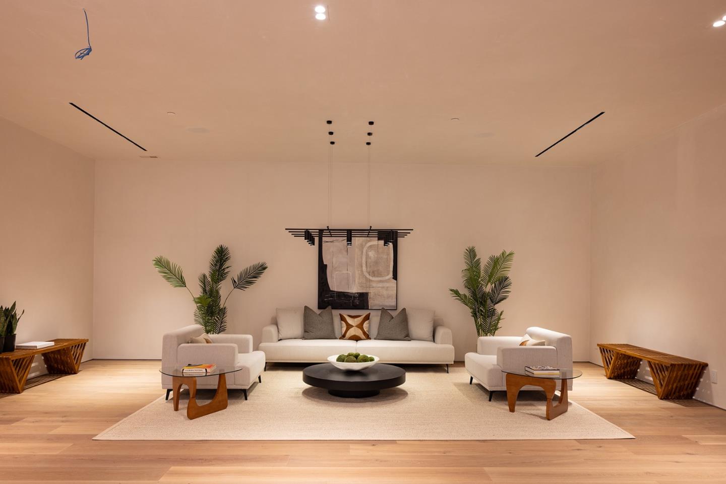 31 Poppy Lane Pebble Beach, CA 93953 - Photo 35 of 45 a living room with furniture and a potted plant