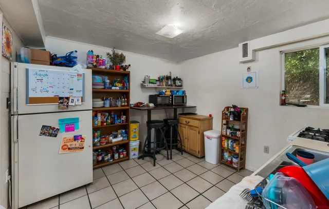 a room with furniture and a book shelf