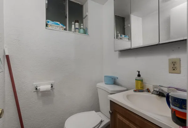 a kitchen with a refrigerator stove and microwave
