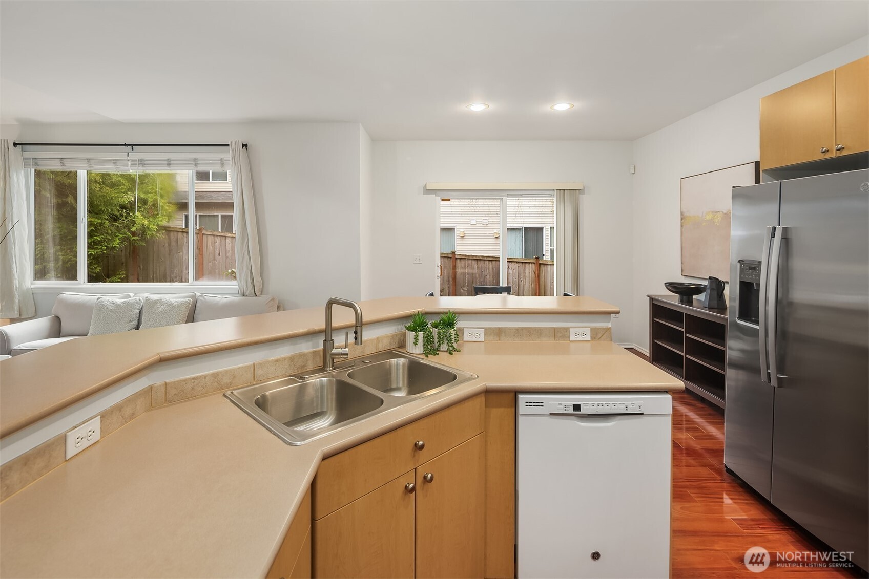 325 South 51st Street, Unit A Renton, WA 98055 - Photo 15 of 39 a kitchen that has a sink a refrigerator and a sink