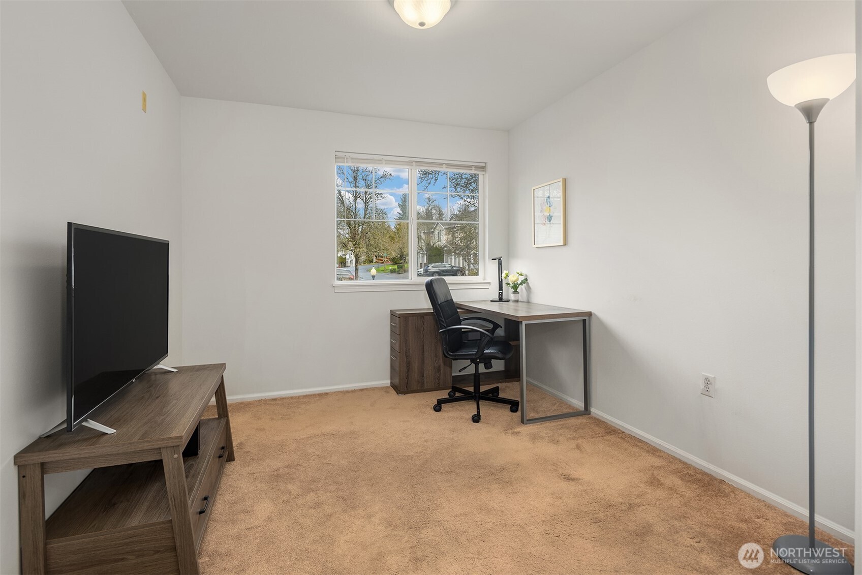 325 South 51st Street, Unit A Renton, WA 98055 - Photo 23 of 39 a view of a workspace with furniture and a window