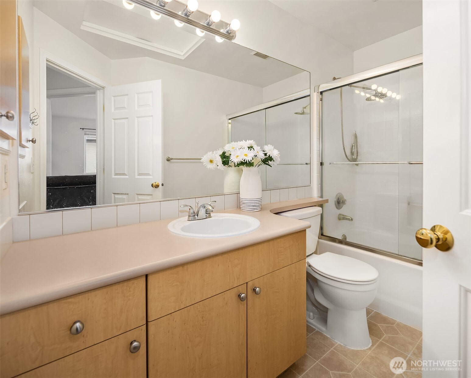 325 South 51st Street, Unit A Renton, WA 98055 - Photo 24 of 39 a bathroom with a sink toilet and shower