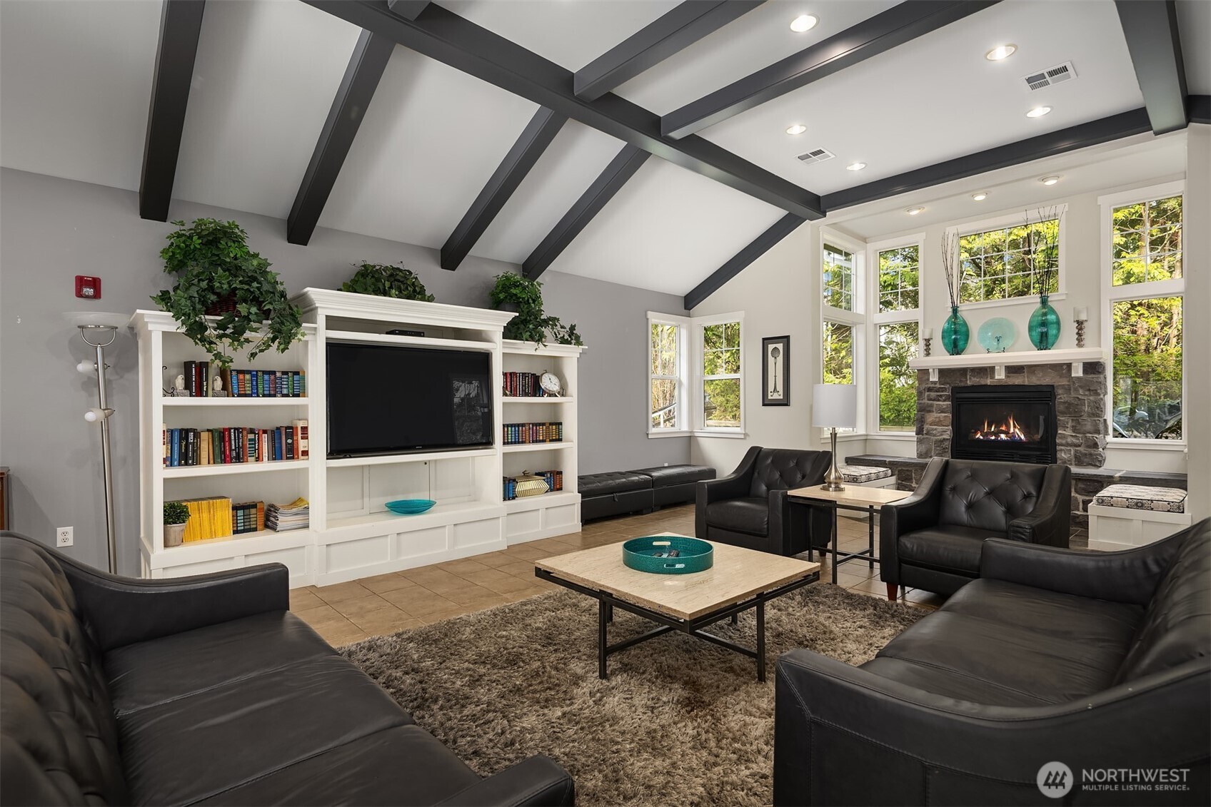 325 South 51st Street, Unit A Renton, WA 98055 - Photo 32 of 39 a living room with furniture and a flat screen tv