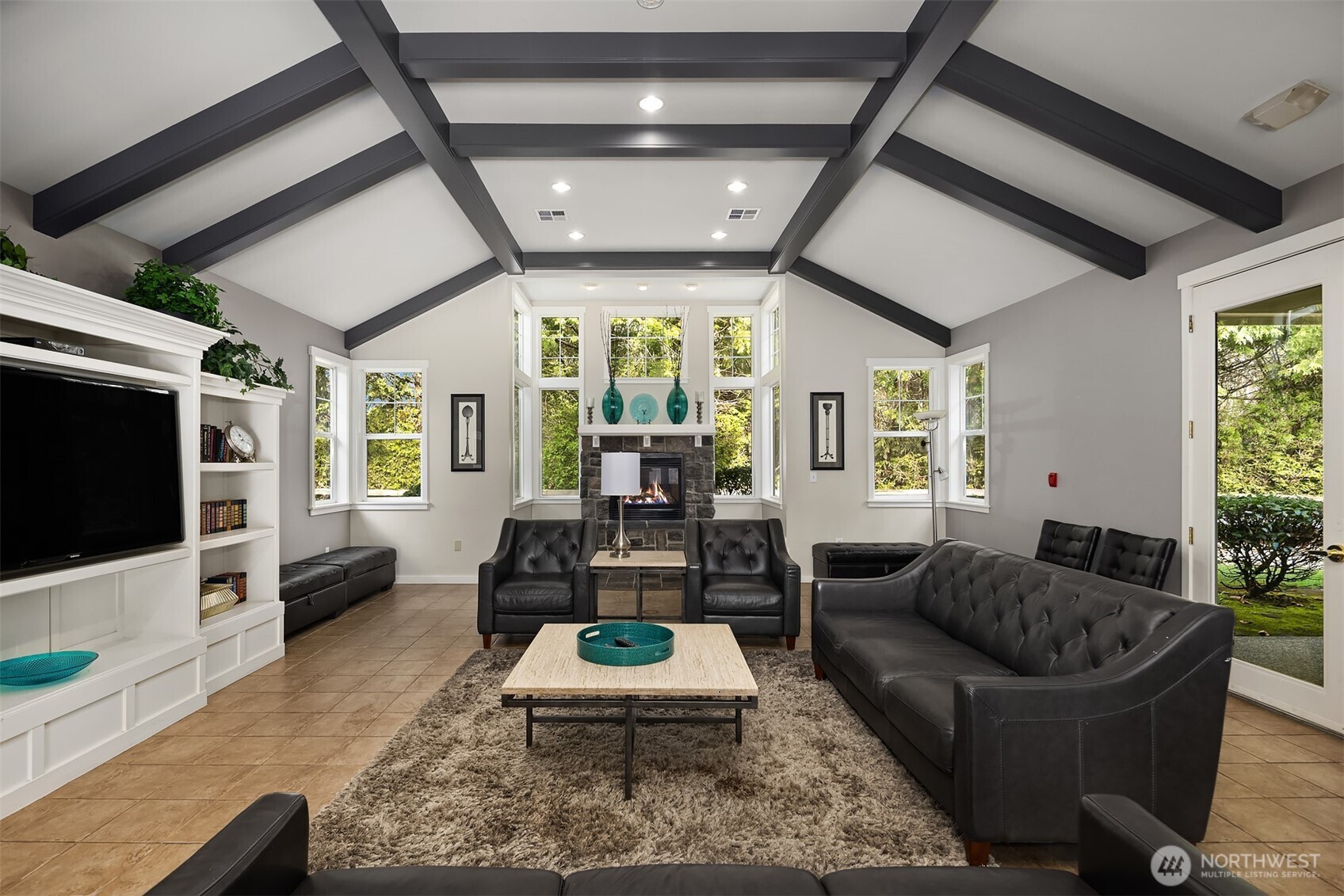 325 South 51st Street, Unit A Renton, WA 98055 - Photo 33 of 39 a living room with furniture and a flat screen tv