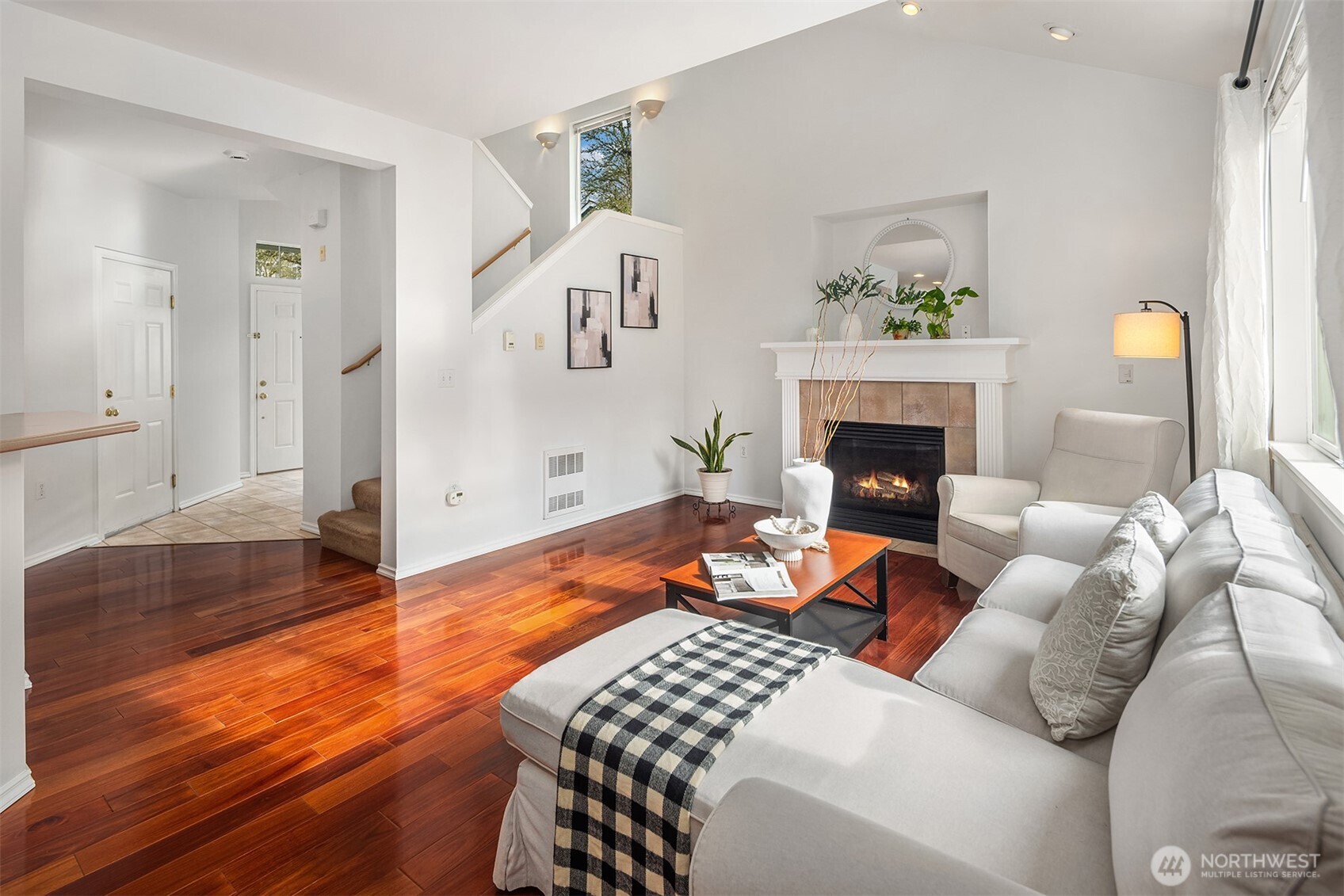 325 South 51st Street, Unit A Renton, WA 98055 - Photo 4 of 39 a living room with furniture and a fireplace