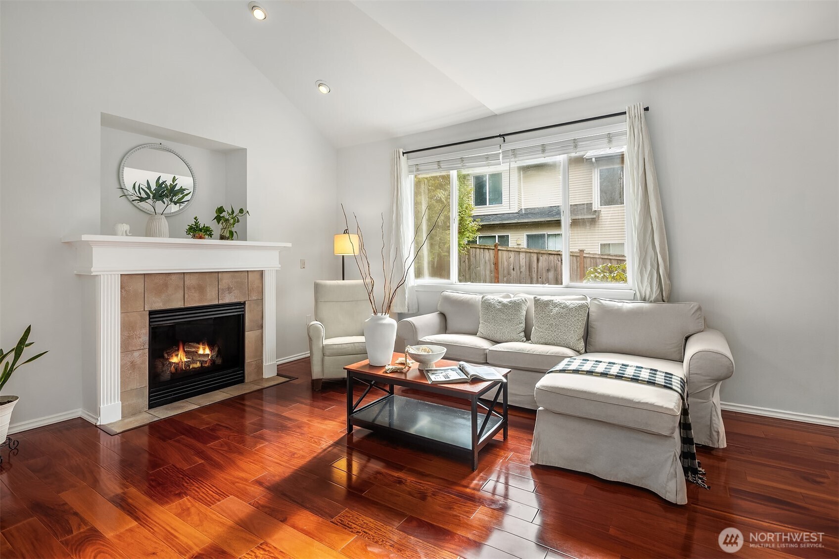 325 South 51st Street, Unit A Renton, WA 98055 - Photo 6 of 39 a living room with furniture and a fireplace