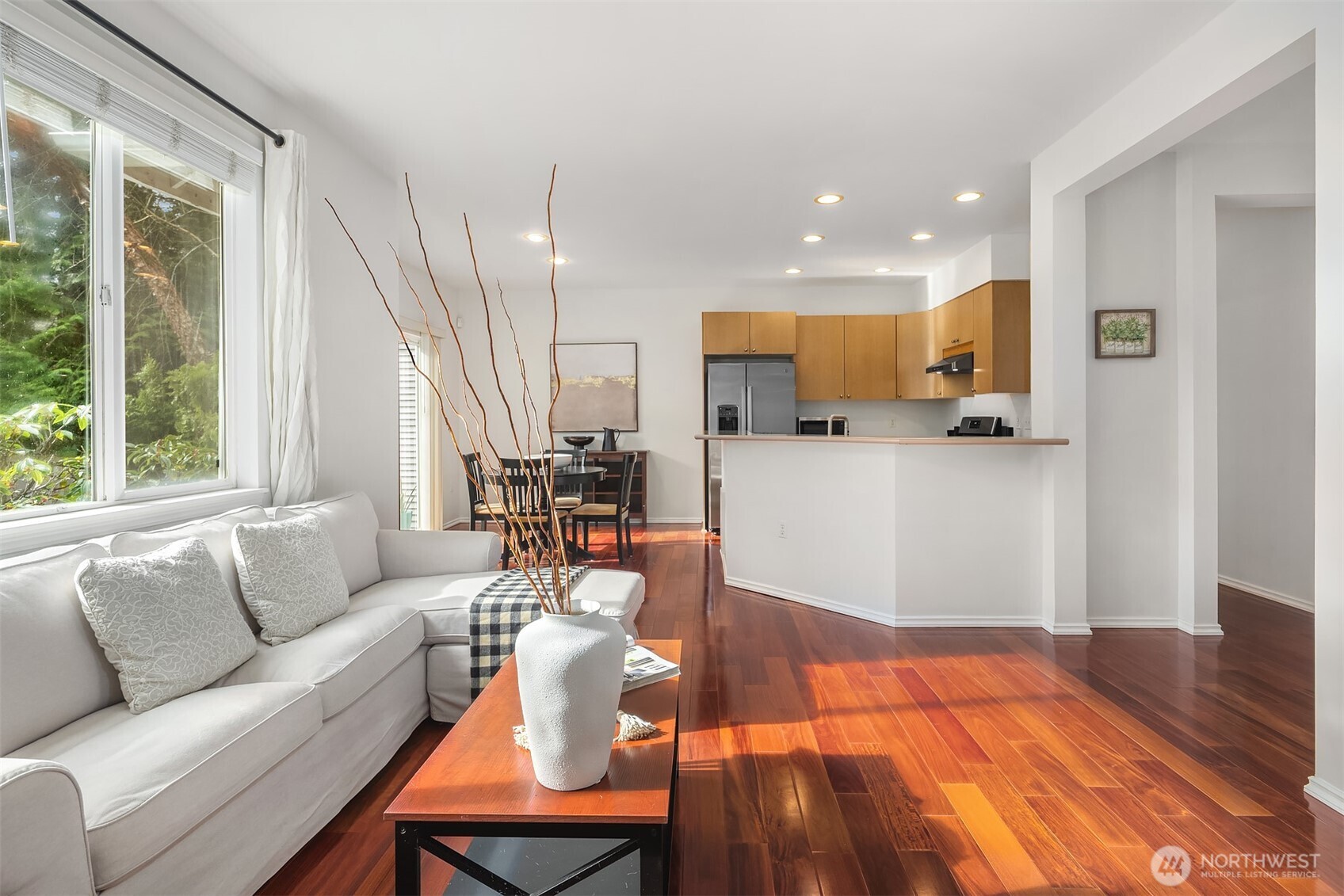 325 South 51st Street, Unit A Renton, WA 98055 - Photo 8 of 39 a living room with furniture and a wooden floor