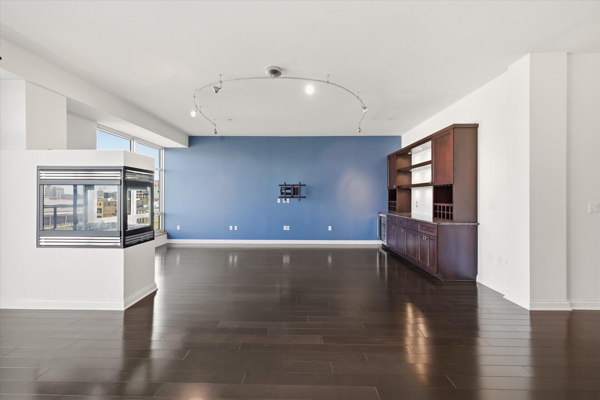 106 West Seeboth Street, Unit 920 Milwaukee, WI 53204 - Photo 11 of 51 10 foot ceilings, hardwood floors, Gas Fireplace