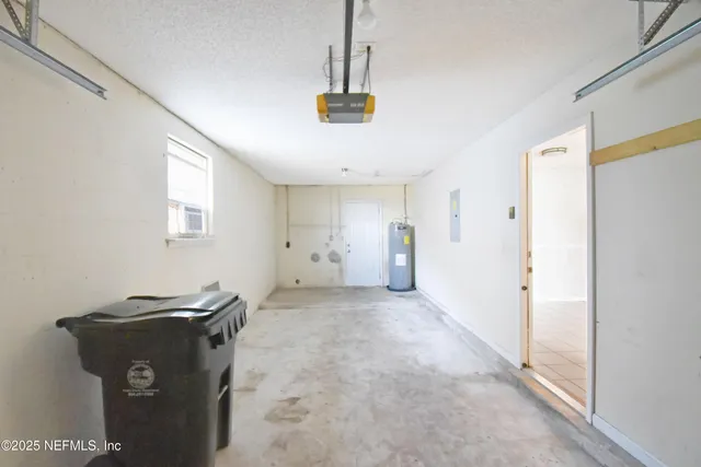 a view of backyard with small cabin