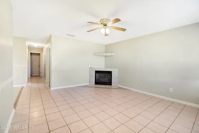 a view of an empty room and window