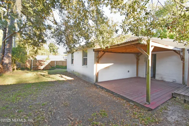 a view of a backyard with a garden