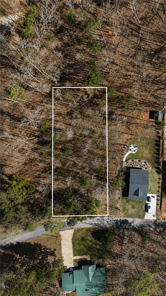 355 Beech Drive Westminster, SC 29693 - Photo 1 of 9 A spacious, wooded lot offers privacy and natural beauty, ideal for crafting a custom dream home.