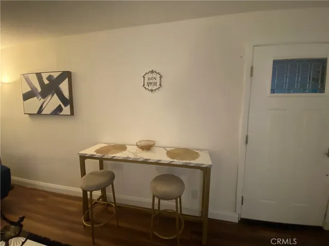 a view of a workspace with furniture