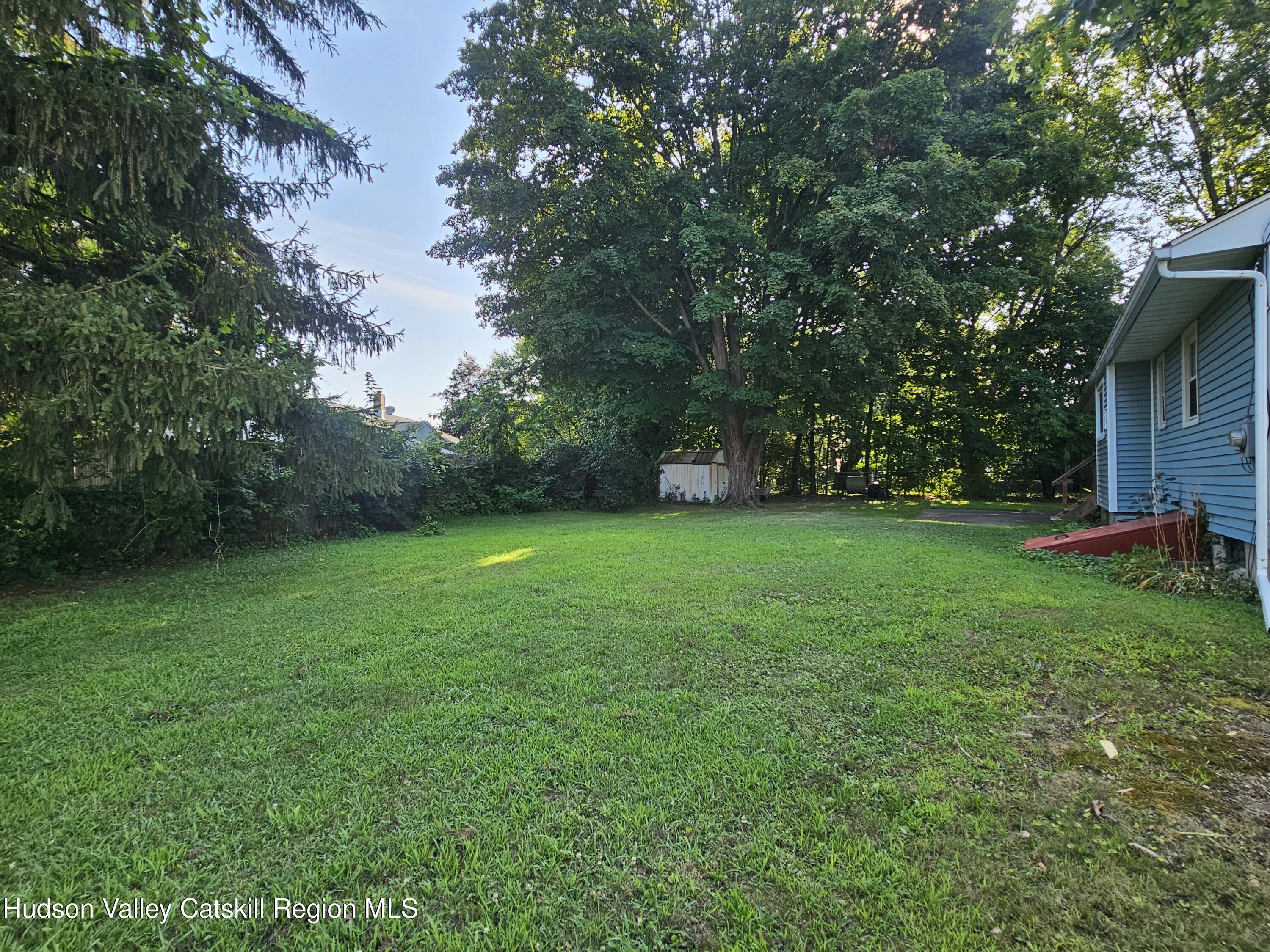 10 Amherst Road Red Hook, NY 12571 - Photo 14 of 20 a view of a garden with a tree
